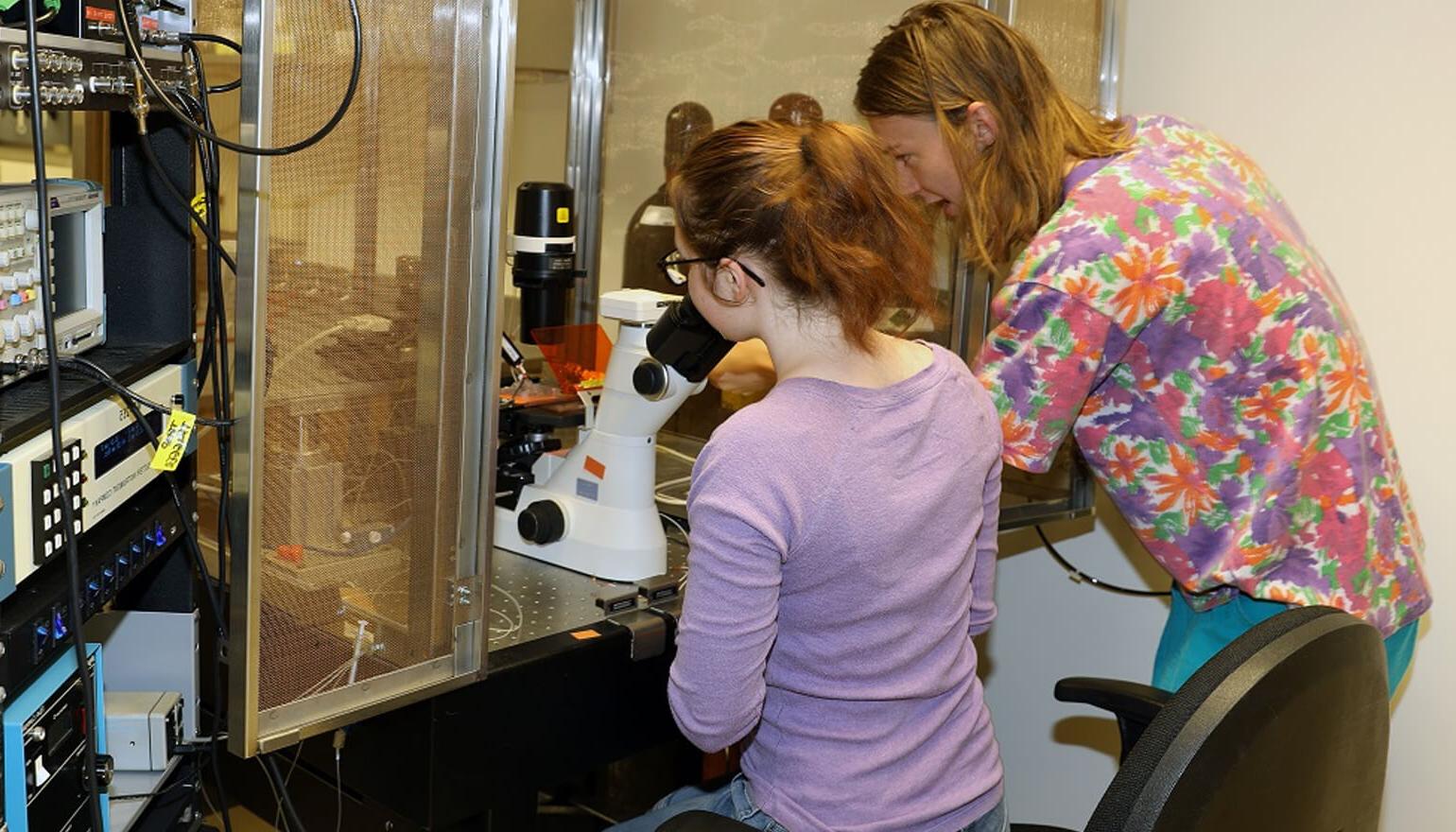 Students working in Biophysics lab